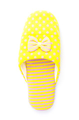 Yellow house slippers isolated on white background