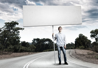 Teenager with banner