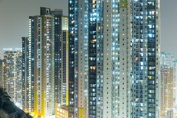 Fototapeta na wymiar Public housing in Hong Kong at night