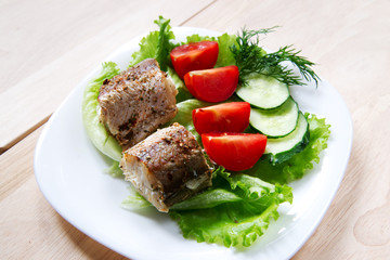 Fried fish with salad