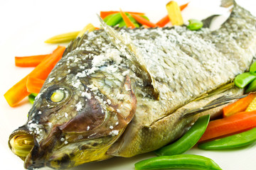 Tilapia grilled on white dish