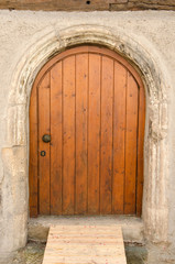 Fototapeta na wymiar Old wooden front door in Tuebingen, Germany