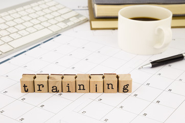 training wording and timetable on office table