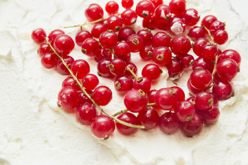 red currant on whipped cream