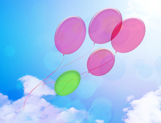 balloons against sky with clouds