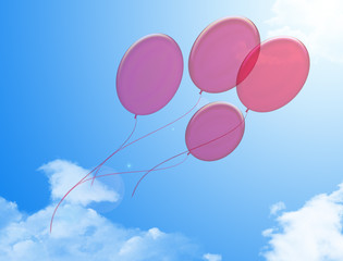 Fototapeta na wymiar balloons against sky with clouds
