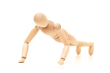 wooden man goes in for sports