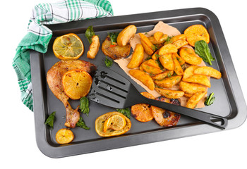 Homemade roasted chicken drumsticks with fried potatoes and