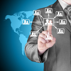 Businessman pressing modern social buttons