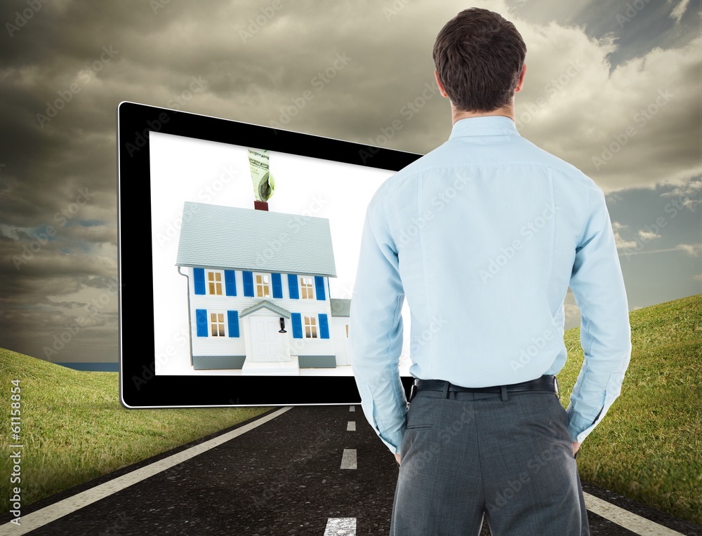 Poster composite image of businessman standing with hands in pockets