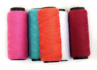 Spool of coloured  thread.