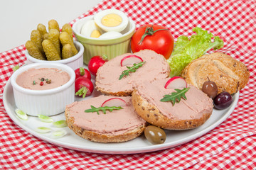Fototapeta na wymiar plate with slices of bread with home made pate with vegetables