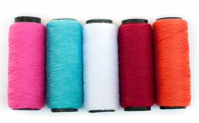 Spool of coloured  thread.