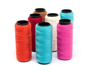 Spool of coloured  thread.