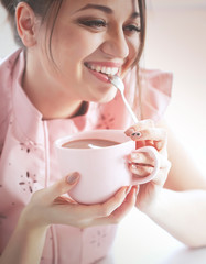 Woman drinking cocoa