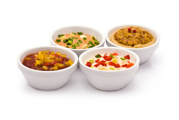 Four Colorful Sauces isolated on white