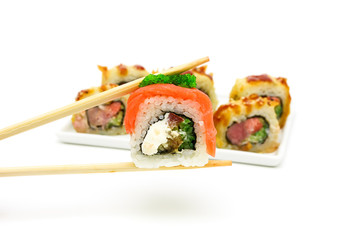 Japanese cuisine - rolls on white background