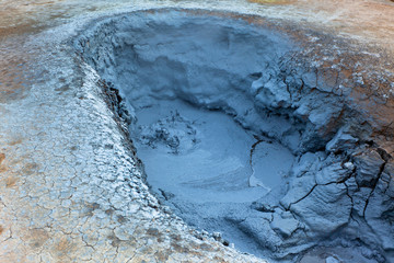 Fototapeta na wymiar Hot Mud Pot in the Geothermal Area Hverir, Iceland