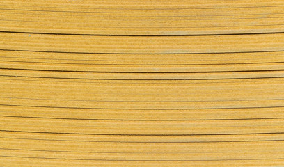 chipboard stack waiting to be processed