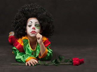 little boy, make-up of the clown, the African