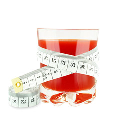 glass of tomato juice and meter