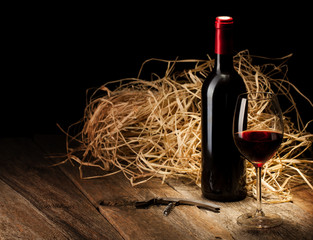 wine bottle and glass with red wine