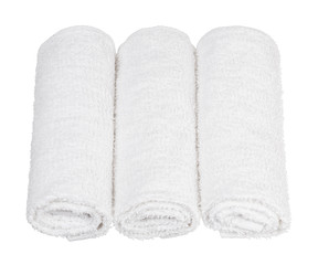 rolled up towels on white background
