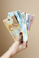 Handful of New Zealand dollars