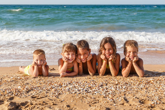 Five kids on the beach