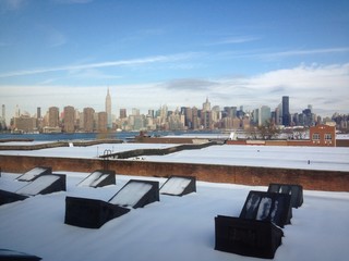 new york city skyline with snow from