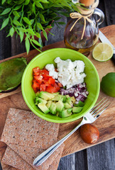 Avocado, tomato, onion and feta cheese salad