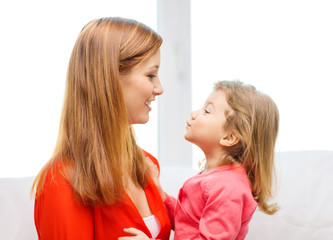 hugging mother and daughter