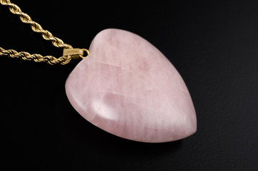 Rose quartz polished heart with golden chain