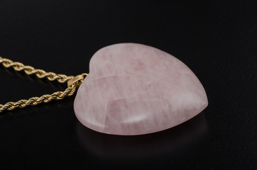 Rose quartz heart with golden chain