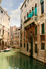 Canal in Venice under clear sky