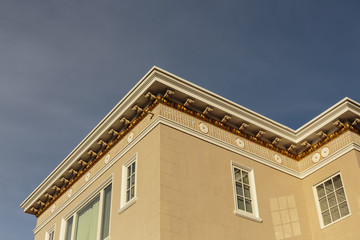 Fototapeta na wymiar Upscale house roof and cornice detail