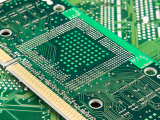 Microchip processor on green pcb motherboard
