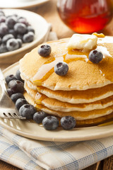Homemade Buttermilk Pancakes with Blueberries and Syrup