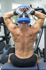 Young man training in the gym