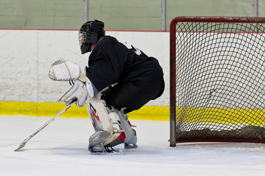 Goalie in his net during an ice hockey game