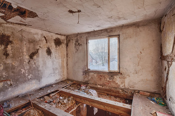 Fototapeta na wymiar Interior of a ruined house