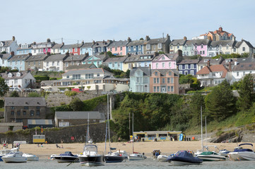 Terraced cottages above harbour town of New Quay