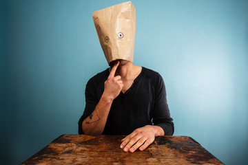 Silly man with a bag over his head - obrazy, fototapety, plakaty