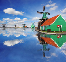Obraz premium Windmills with canal in Zaanse Schans, Holland