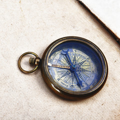 Fototapeta na wymiar compass on old paper