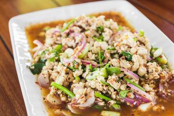 spicy minced pork salad with roasted rice powder