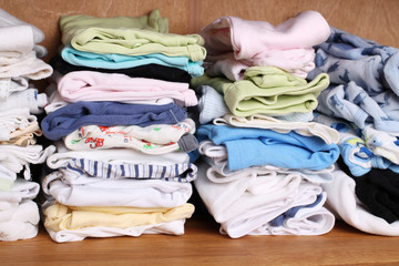 clothing for babies in a wardrobe