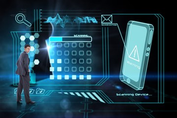 Composite image of serious businessman with hands on hips