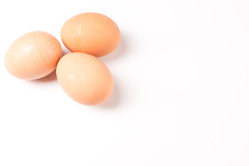 Three eggs isolated on white background