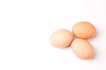 Three eggs isolated on white background